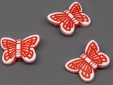 Пеперуда бяло и червено 14x11mm, отвор 1.5mm - 500g ≈ 1860 бр.